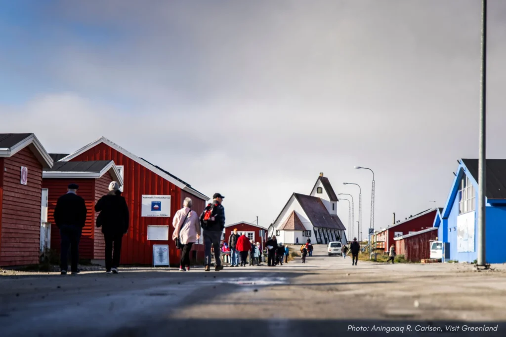 10. Walking towards the church in Nanortalik. Photo by Aningaaq R. Carlsen - Visit Greenland