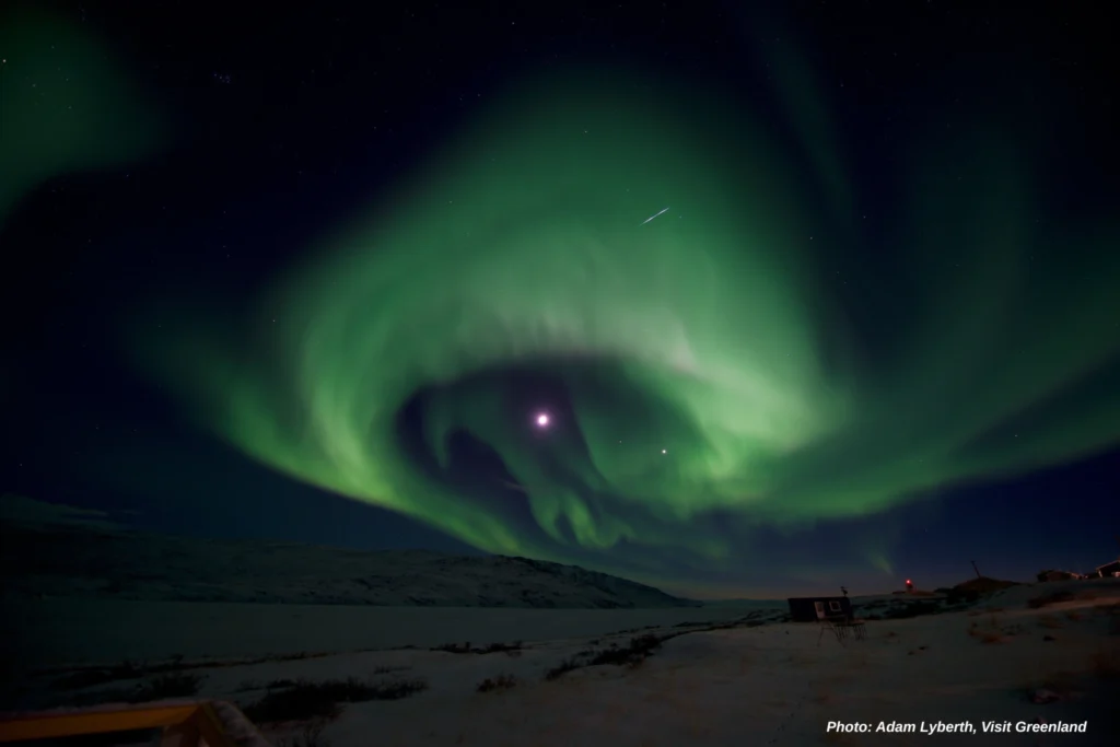 Moon Surrounded by Northern Lights - Adam Lyberth, Visit Greenland