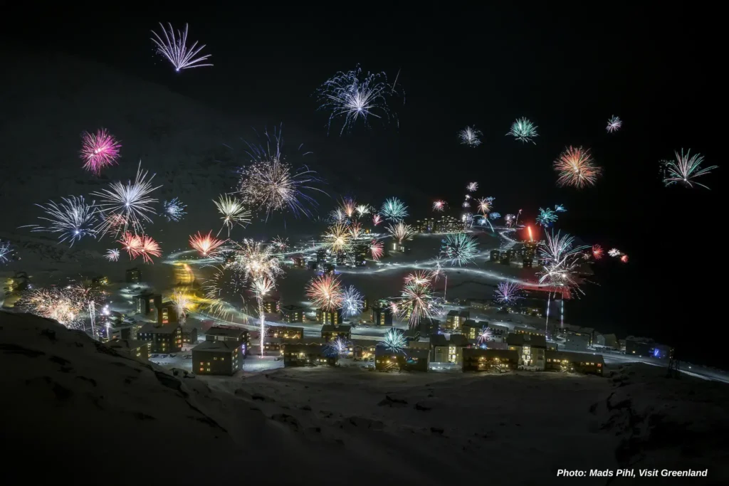 New Year_s Eve lights up over the Nuuk suburb Qinngorput in Greenland