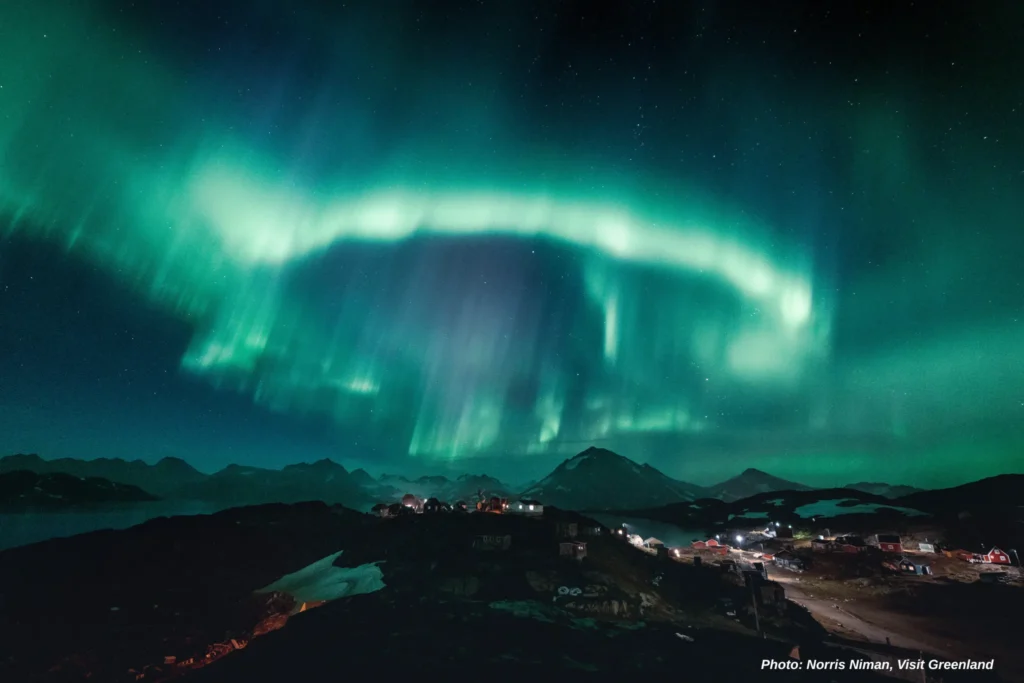 Northern sky disco over Kulusuk. Photo by Norris Niman - Visit Greenland