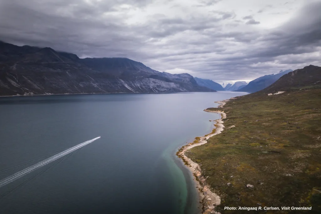 Sailing in to the fjord. Photo by Aningaaq R. Carlsen - Visit Greenland