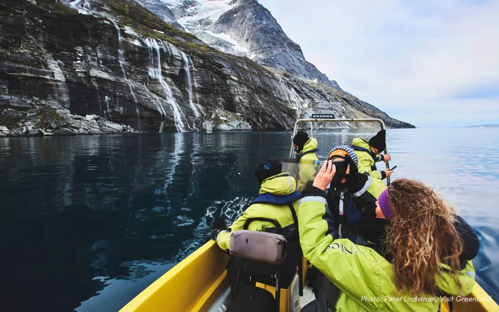 Nuuk Water Taxi stopping at waterfall