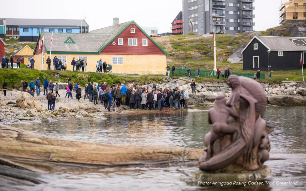 People near Mother of the Sea