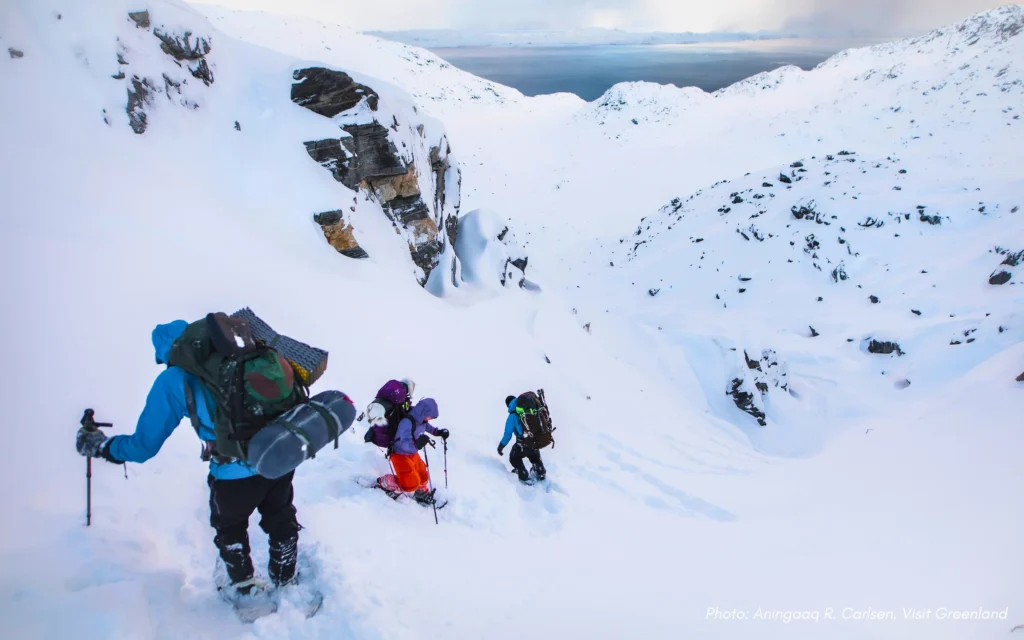 Snowshoeing Down Steep Hill