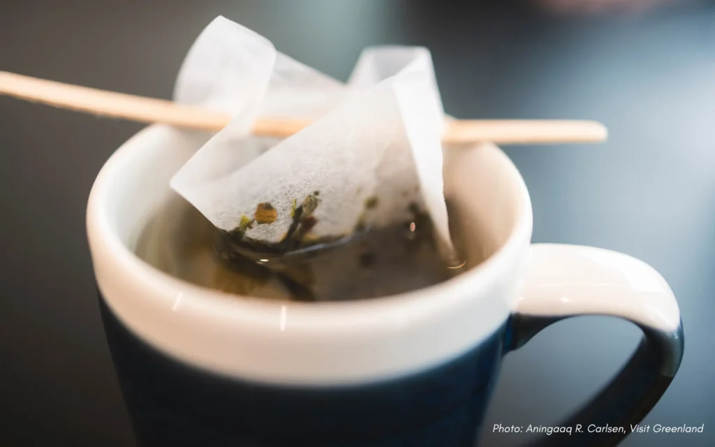 Warm cup of tea with local plants